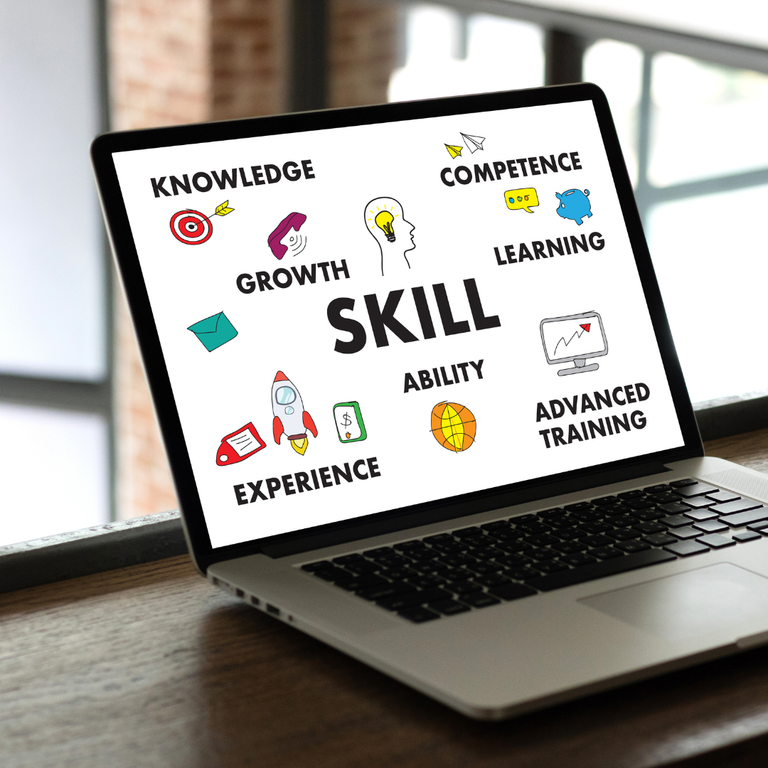 An image of a laptop on a desk. On the screen are words about professional development including skill, knowledge, growth, competence, learning, experience, and advanced training. 